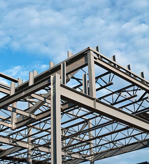 The steel frame of a new office building under construction.Similar Images.